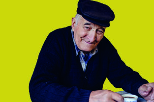 Elderly man drinking tea